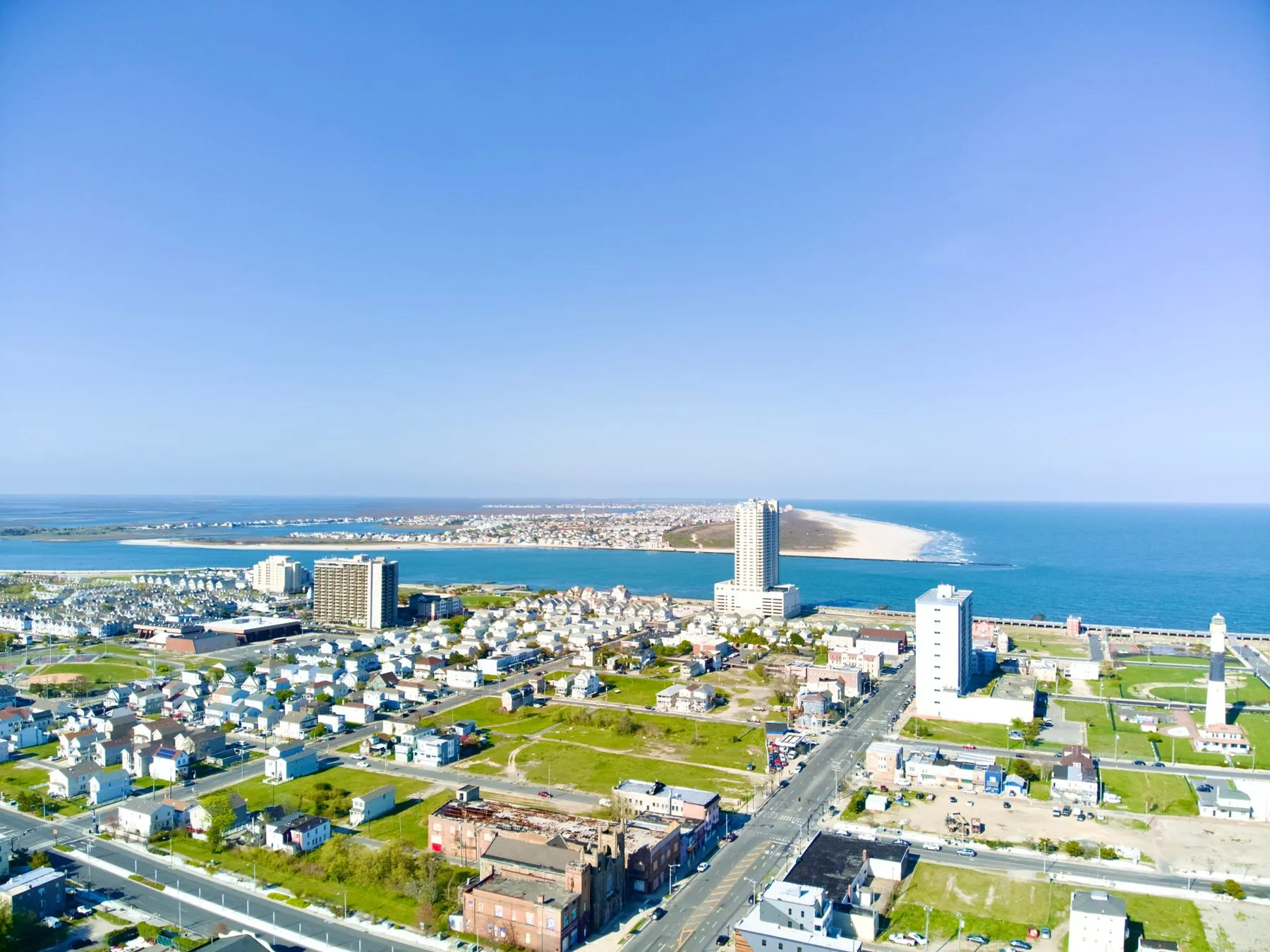 Atlantic City from the air, with homes along the inlet and the ocean beyond